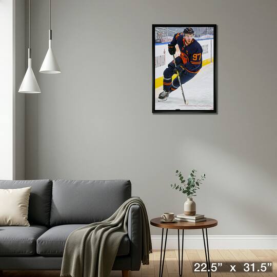 Connor McDavid Edmonton Oilers Framed 20" x 29" Skating with Puck Canvas